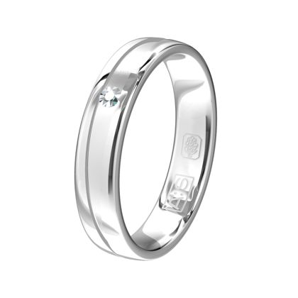 Een rond gevormde witgouden ring met een uitgefreesde binnenbaan, hierin is een briljant vastgezet